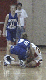 Laen Stewart #22 strips the ball from TW's #35